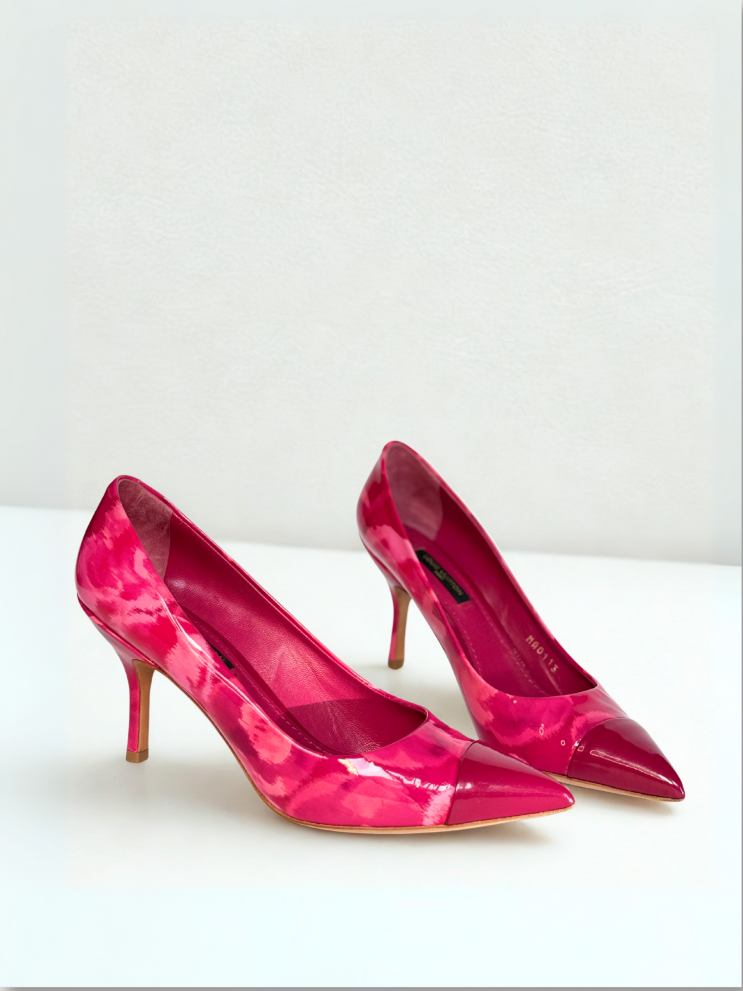 Side view of Louis Vuitton Vernis Ikat Pumps in pink, size 36