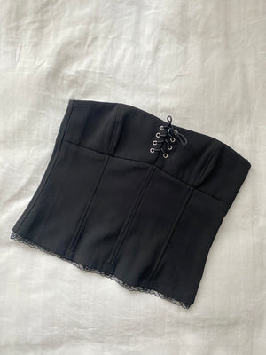 Schwarzes Korsett mit Schnür Details Trägerlos